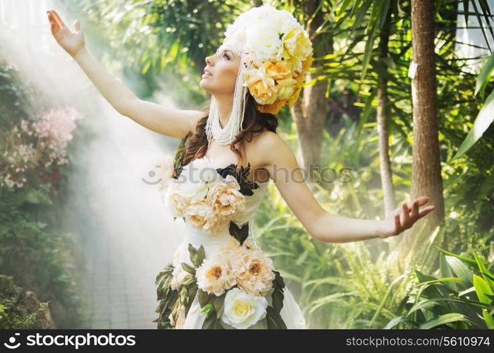 Shiny dark-haired lady in the rain forest