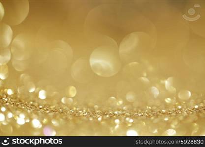 Shiny glitter bokeh background. Abstract golden shiny glitter bokeh christmas background