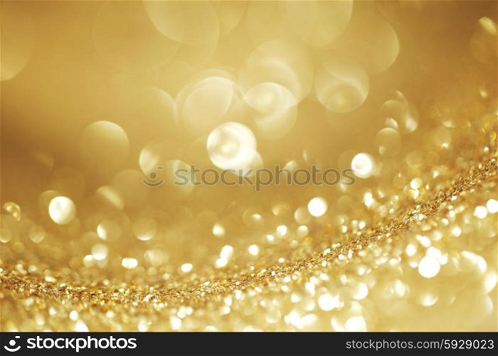 Shiny glitter bokeh background. Abstract golden shiny glitter bokeh christmas background
