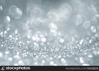 Shiny glitter bokeh background. Abstract silver shiny glitter bokeh christmas background