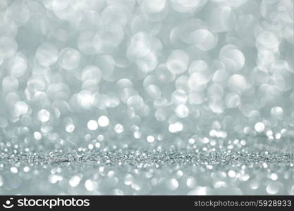 Shiny glitter bokeh background. Abstract silver shiny glitter bokeh christmas background