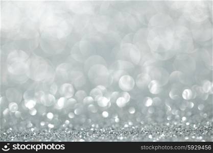 Shiny glitter bokeh background. Abstract silver shiny glitter bokeh christmas background