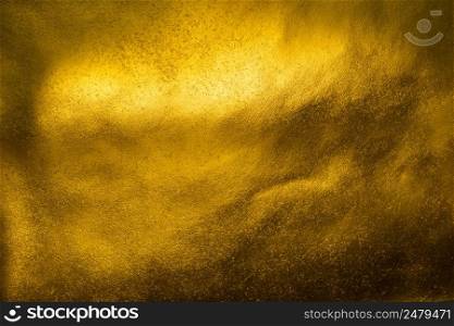Shiny golden paper sheet texture background