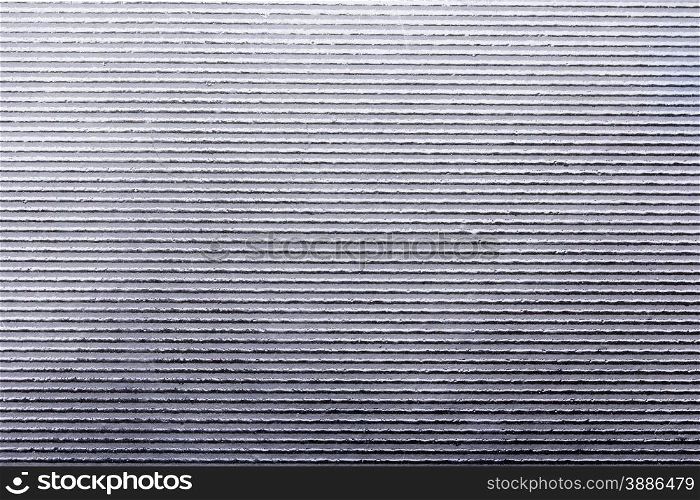 Shiny metal background with horizontal lines. Metal background