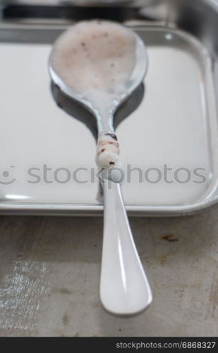 Shiny milk chocolate stain spoon, stock photo