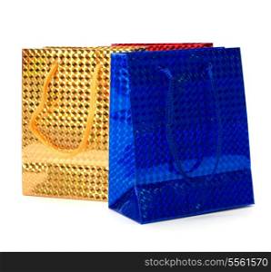 shiny paper gift bags isolated on white background