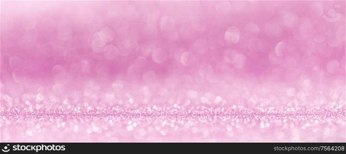 Shiny pink bokeh glitter lights abstract background, Valentine&rsquo;s day party celebration concept. Shiny pink lights background