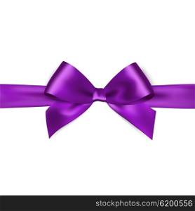 Shiny purple satin ribbon on white background. Shiny purple satin ribbon on white background. purple bow. Purple bow and purple ribbon