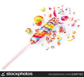 Shiny rainbow multicolored crushed candy lollipop isolated on white background