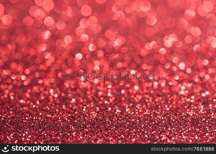 Shiny red bokeh glitter lights abstract background, Christmas New Year party celebration concept. Shiny red lights background