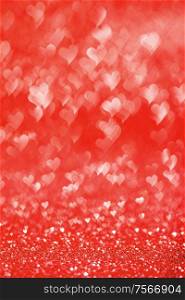 Shiny red heart love bokeh glitter lights abstract background, Valentine&rsquo;s day party celebration concept. Shiny red heart lights background