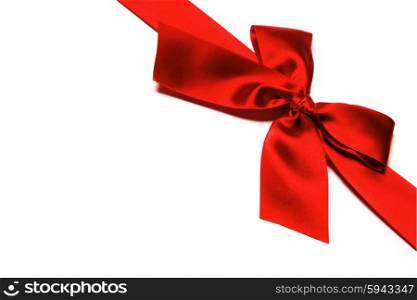 Shiny red satin ribbon decorative on white background