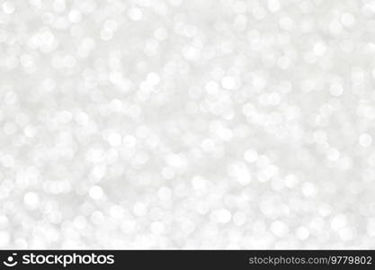 Shiny silver bokeh glitter lights abstract background, Christmas New Year party celebration concept. Shiny silver lights background