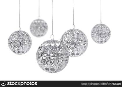 Shiny silver Christmas ball hanging, isolated on white background. Silver Christmas ball