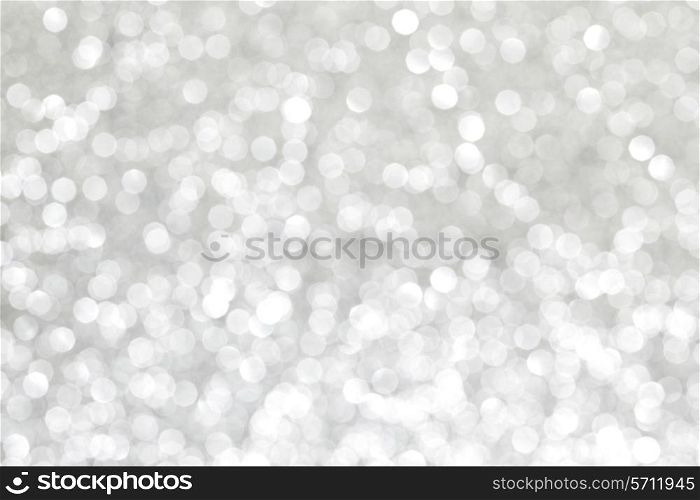 Shiny silver defocused glitter holiday background
