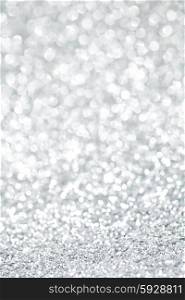 Shiny silver defocused glitter holiday background