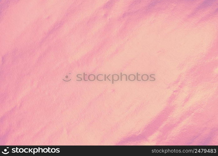 Shiny trendy pastel colored foil texture background