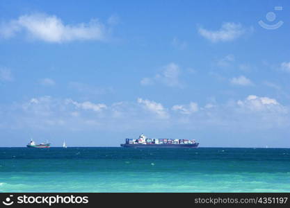 Ship and a boat in the sea, South Beach, Miami, Florida, USA