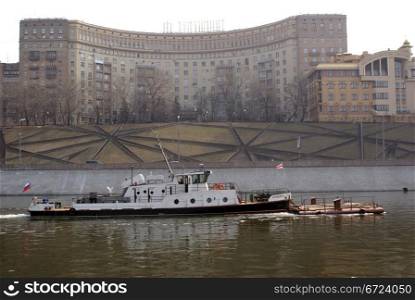 Ship and building on the Moscow river in Russia