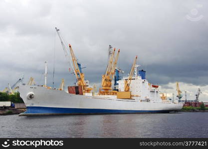 Ship and cranes. Harbor activity. St. Petersburg. Russia.