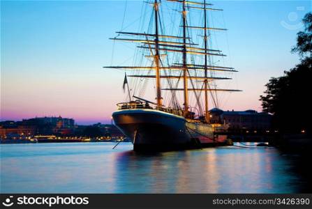 Ship at sunset, Stockholm, Sweden. Romantic view on the city