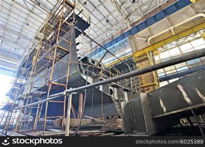 Ship building and scaffolding in a shipyard