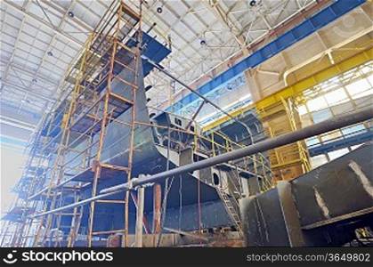 Ship building shoot inside of shipyard