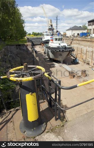 ship in dock on the island of suomenlinna near helsinki