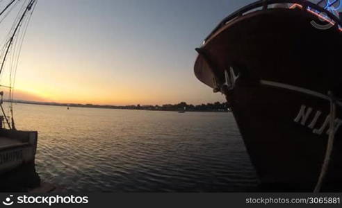 ship in port at sunset