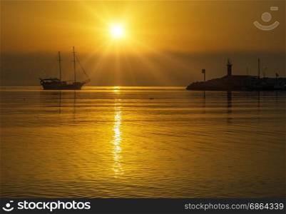 Ship on a sunset background in the city of Kemer in Turkey.