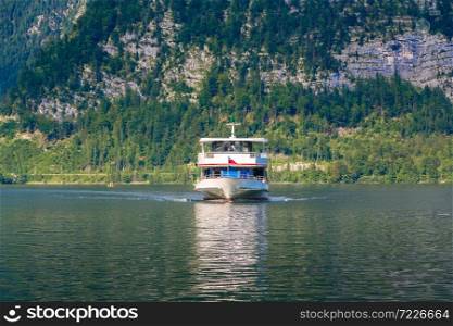 Ship on Hallstatt lake, Salzkammergut, Alps, Austria in a beautiful summer day