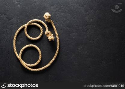 ship rope at old black background