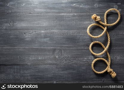 ship rope at wooden background texture