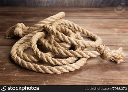 ship rope at wooden board background texture