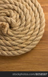 ship ropes on wooden background