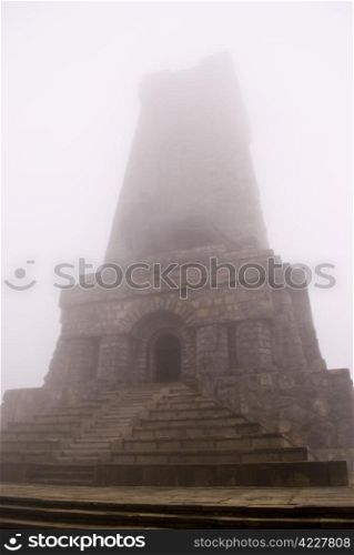 Shipka in heavy clouds ? landmark stone monument in Stara planina