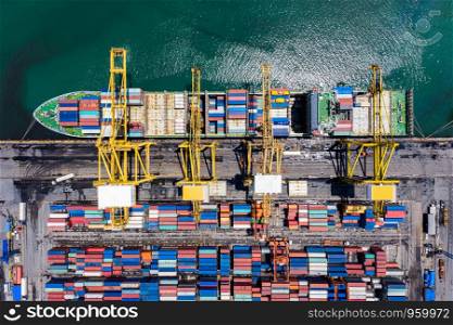 shipping cargo containers loading and unloading port business services import export cargo international ocean fright in Thailand aerial top view