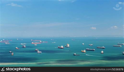 shipping, transport and seafaring concept - boats sailing in ocean. boats sailing in ocean