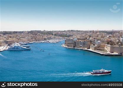 Ships and yachts in the historic port of Valetta Malta
