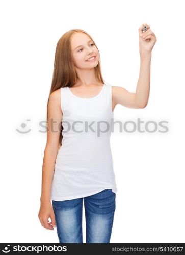 shirt design concept - smiling teenage girl in blank white shirt drawing or writing something in the air