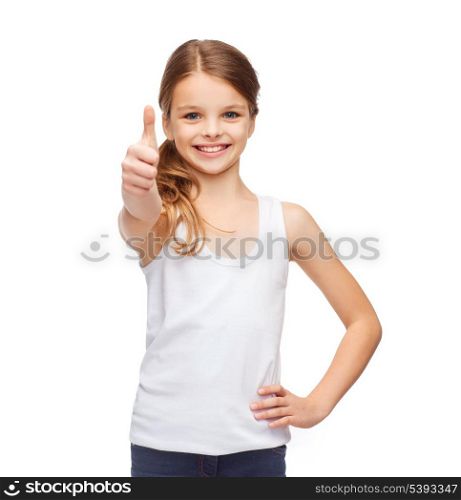 shirt design concept - smiling teenage girl in blank white shirt showing thumbs up