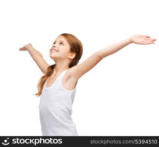 shirt design, happiness, freedom, future concept - smiling teenage girl in blank white shirt with raised hands