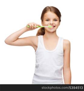 shirt design, health, oral hygiene, dental concept - smiling teenage girl in blank white shirt brushing her teeth