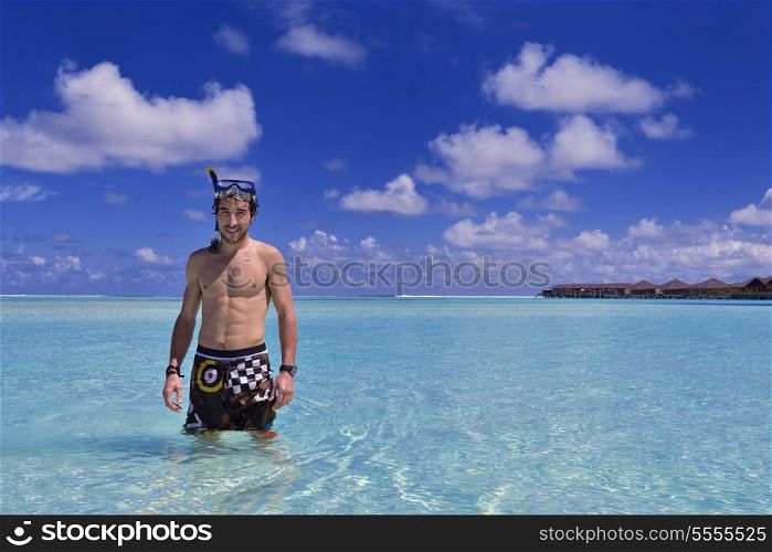 Shirtless young guy with diving mask