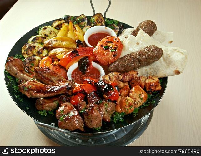 shish kebab mix. Various types mat roasted with vegetable closeup