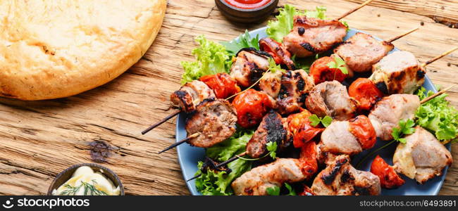 Shish kebab of pork. Grilled shish kebab or shashlik on skewers.Eastern food.BBQ