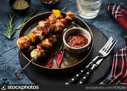 Shish kebab with mushrooms, cherry tomato and sweet pepper, Grilled meat skewers.