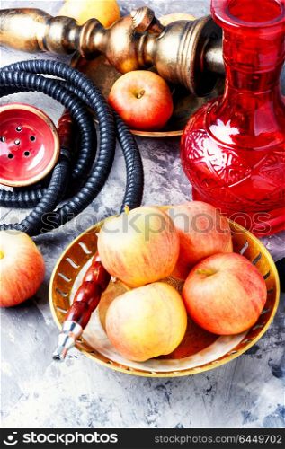 Shisha hookah with apple. Smoke hookah with apple.Shisha concept.Hookah concept.Apple hookah
