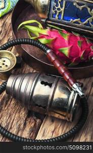 Shisha hookah with pitahaya. Smoking hookah with tobacco with pitahaya flavor