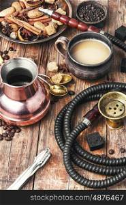 Shisha with coffee. aroma oriental hookah with coffee in vintage style